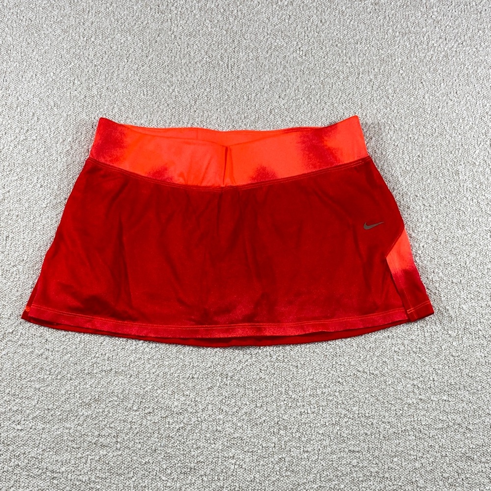 Nike woman’s medium Dynamic Red and Orange Skirt tennis skirt